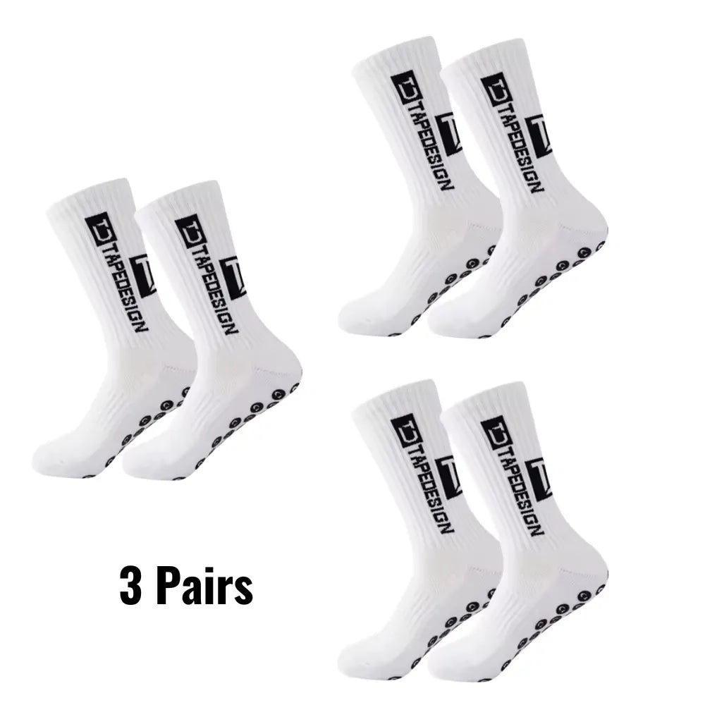 Set of 3 pairs of white Tapedesign non-slip socks with '3 pairs' text