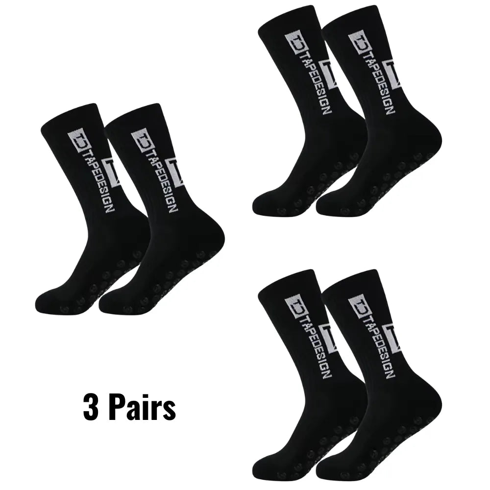 Set of 3 pairs of black Tapedesign non-slip socks with '3 pairs' text