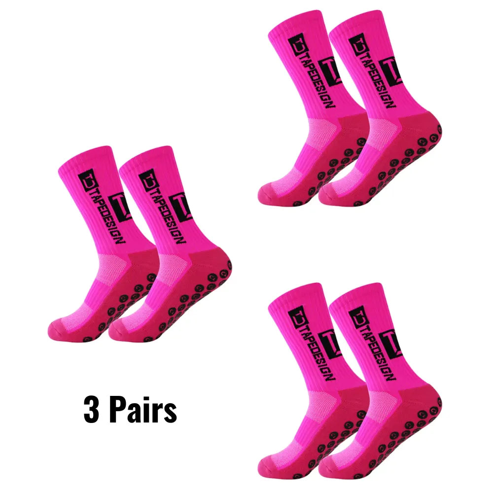 Set of 3 pairs of pink Tapedesign non-slip socks with '3 pairs' text.